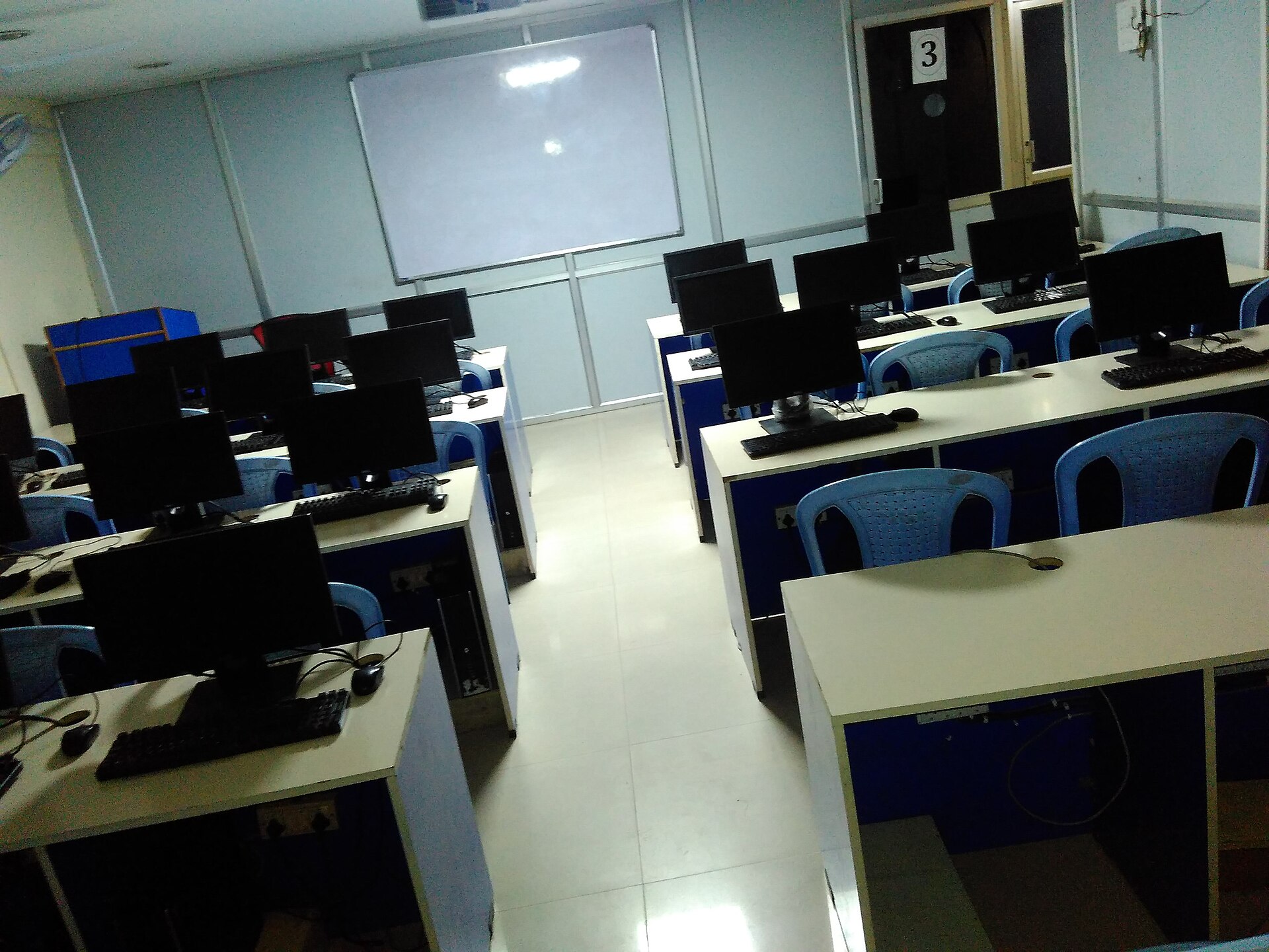 Classroom with laptops prepared for practical technical training